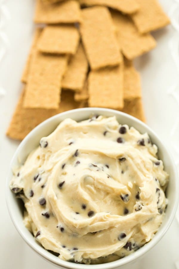 Chocolate Chip Cookie Dough Dip - A sweet, creamy dip that tastes like chocolate chip cookie dough without the guilt of raw egg! | browneyedbaker.com #recipe