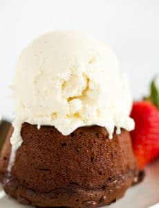Gooey Chocolate Cakes - Baked in individual servings and packed with loads of chocolate flavor, this recipe from Dorie Greenspan is perfect for dinner parties or keeping some dessert stashed in the freezer!