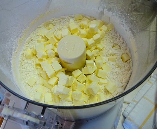 Pie crust: Add butter to the flour/salt mixture in food processor