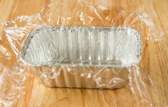 Homemade American Cheese: Lining pan with plastic wrap