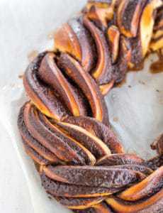 Chocolate Babka shaped into a braided wreath for the most decadent holiday breakfast (or dessert, or snack)! | browneyedbaker.com