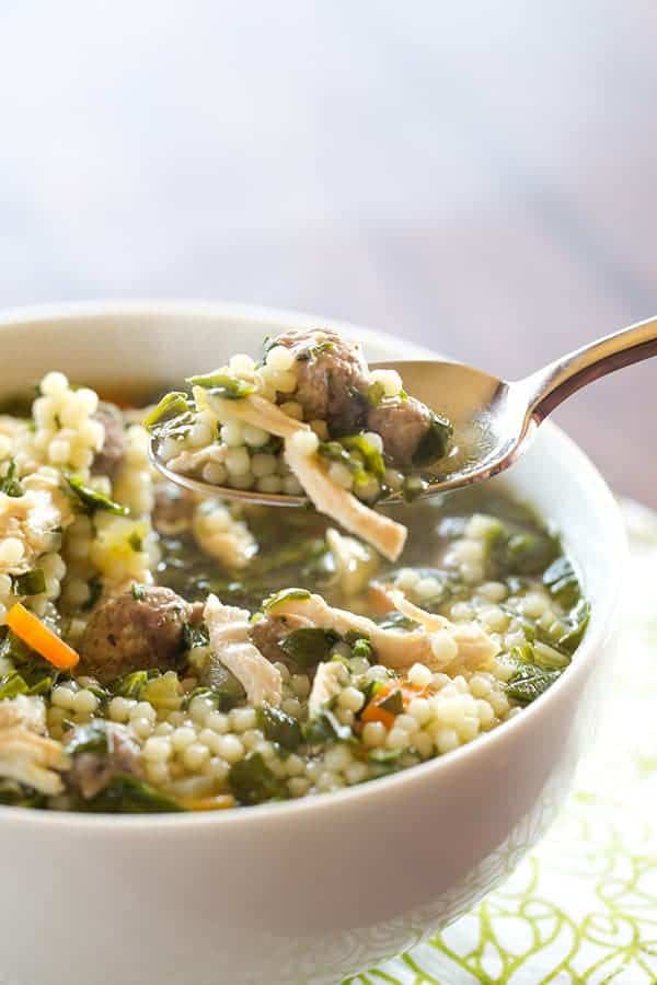 A classic Italian wedding soup recipe, with little bits of pasta, shredded chicken, spinach and of course those little meatballs!