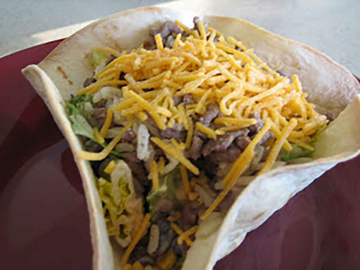 Taco rice salad in a homemade tortilla bowl.