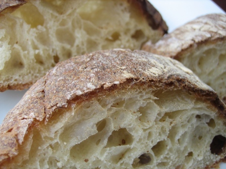 Close up image of slices of rustic bread.