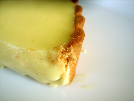 Close up image of orange cream tart.