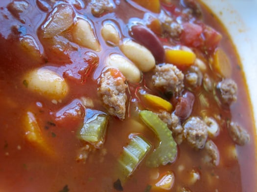 Close up image of pasta fagioli soup.