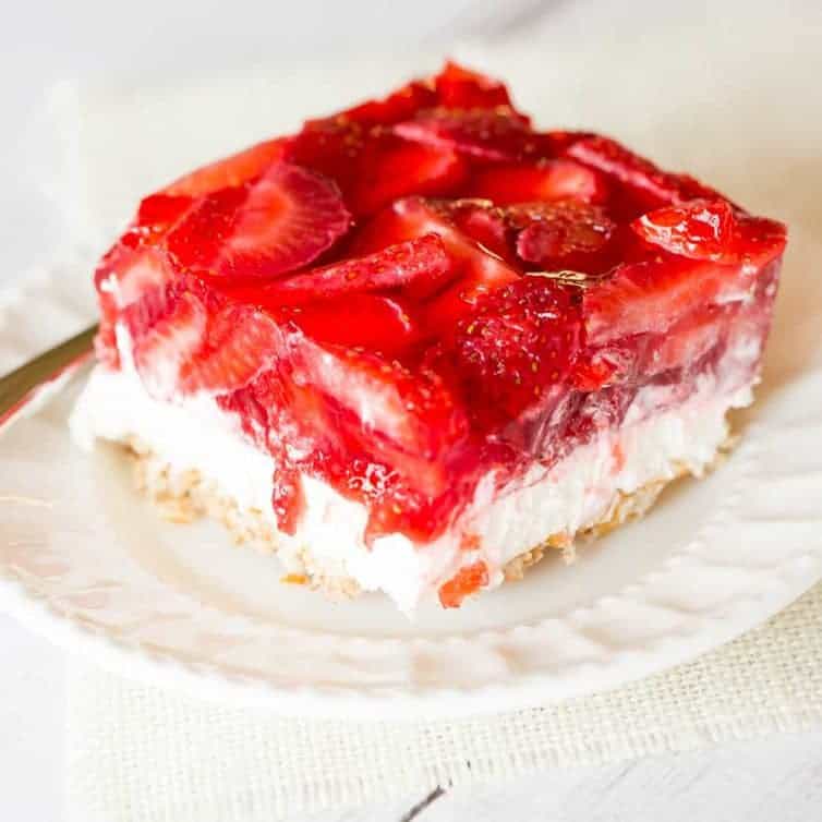 Strawberry Pretzel Salad - The absolutely wonderful nostalgic dessert that showed up at every summer family picnic growing up! | browneyedbaker.com
