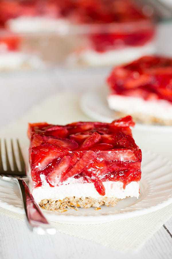 Strawberry Pretzel Salad - The absolutely wonderful nostalgic dessert that showed up at every summer family picnic growing up! | browneyedbaker.com