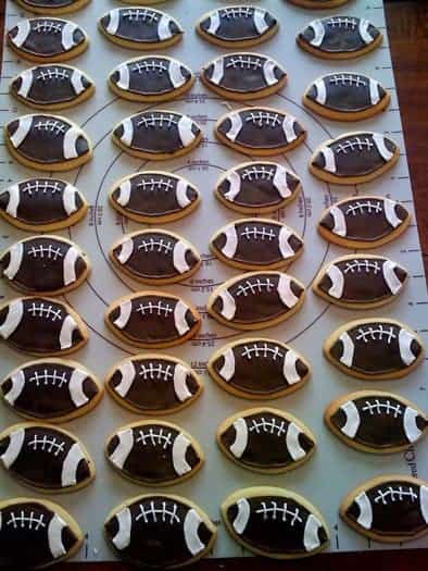 Sugar cookies decorated like footballs.