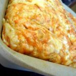 Three cheese beer bread in a loaf pan.