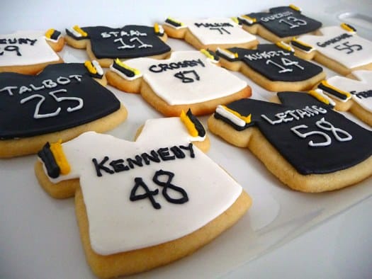 Sports jersey shaped decorated sugar cookies.