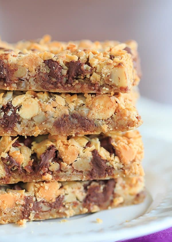 Seven Layer Bars, aka Magic Bars - Seven glorious layers of graham crackers, nuts, chocolate chips, white chocolate chips, butterscotch chips, coconut and sweetened condensed milk! | https://www.browneyedbaker.com/seven-layer-bars/