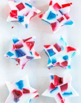 A tray of red, white and blue stained glass Jello stars.