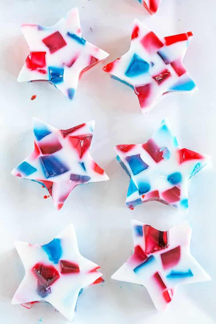 A tray of red, white and blue stained glass Jello stars.