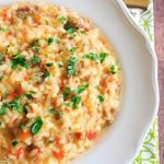 Sausage, Pepper & Mushroom Risotto - A hearty meal that needs only Italian bread and a big salad as an accompaniment! | https://www.browneyedbaker.com/italian-sausage-red-pepper-and-mushroom-risotto/