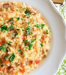 Sausage, Pepper & Mushroom Risotto - A hearty meal that needs only Italian bread and a big salad as an accompaniment! | https://www.browneyedbaker.com/italian-sausage-red-pepper-and-mushroom-risotto/