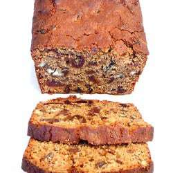 Date nut spice bread with 2 slices cut.