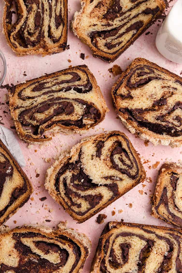 Slices of chocolate babka laying out on a serving board.