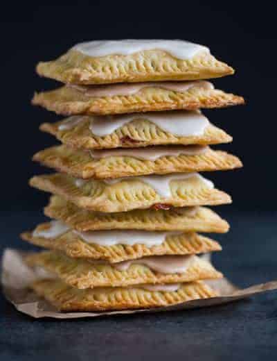 Homemade Pop Tarts - A big stack of strawberry and brown sugar cinnamon pop tarts.
