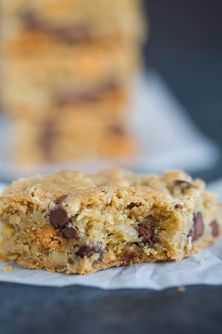 A fully-loaded chewy, chunky blondie with a big bite taken out!