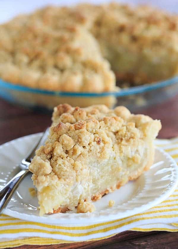 Dutch Apple Pie - A perfect crust piled high with the best apple filling and topped with a crunchy crumb. The perfect fall dessert! | browneyedbaker.com
