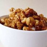 Homemade Cracker Jack popcorn in a white bowl.