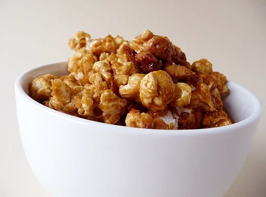 Homemade Cracker Jack popcorn in a white bowl.