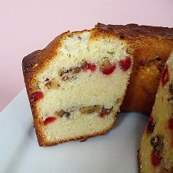 Side view of Russian pound cake with a slice removed showing the inside texture and layers.