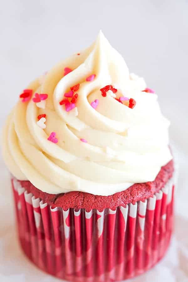 The BEST red velvet cupcakes - a gorgeous red color, moist and fluffy, and topped with luscious cream cheese frosting.