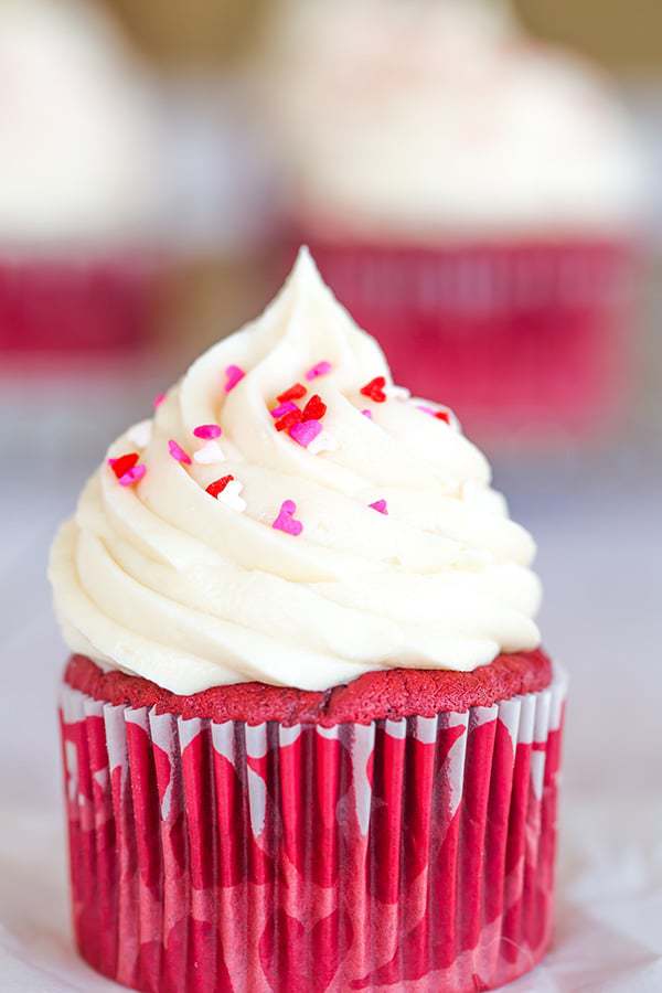 The BEST red velvet cupcakes - a gorgeous red color, moist and fluffy, and topped with luscious cream cheese frosting.