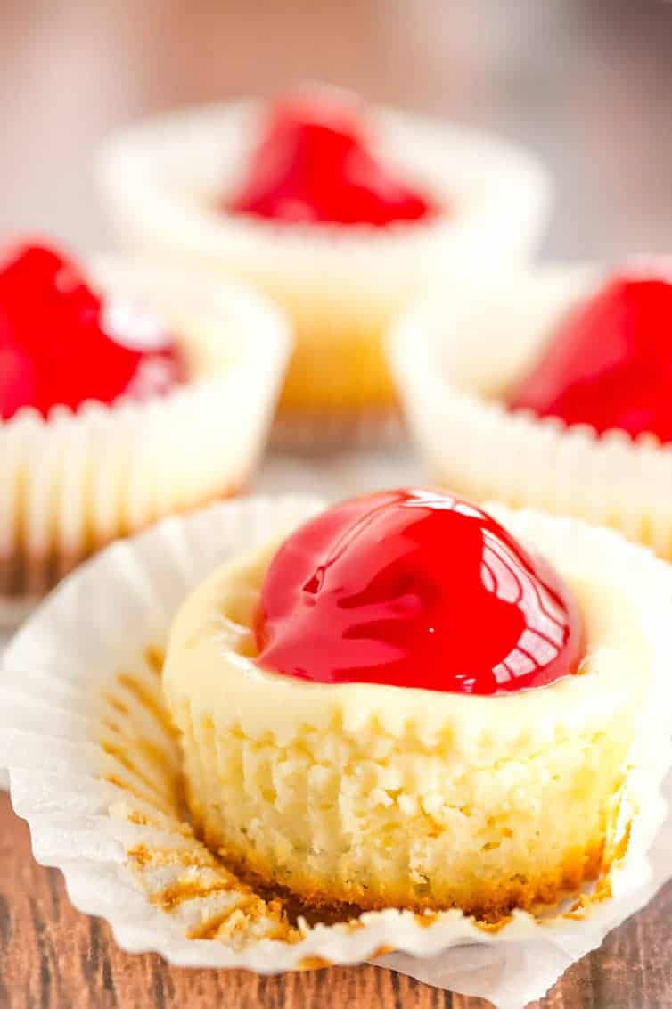 These easy mini cheesecakes have been a holiday staple in my family forever! Nilla wafers are topped with cheesecake batter and cherry pie filling. A perfect bite-size treat!