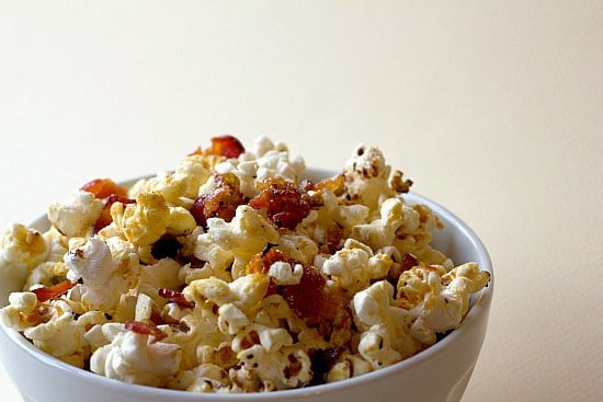 Maple bacon kettle popcorn in a white bowl.