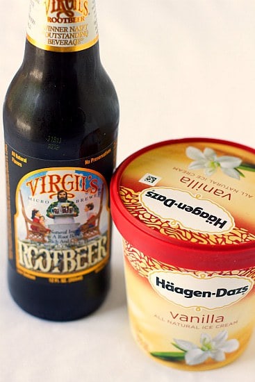 A bottle of root beer and a pint of vanilla ice cream.