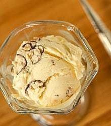 Overhead image of malted milk ice cream in a glass.