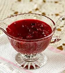 Cranberry sauce in a glass serving bowl.