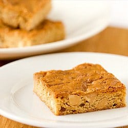 Peanut butter blondie on a white plate.