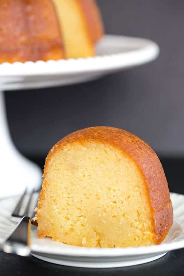 This rum cake is made completely from scratch, has the most tender, moist crumb, and is drenched in rum flavor without being overpowering. Perfection!