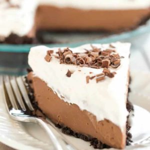 Chocolate Cream Pie - A classic (from scratch!) recipe with Oreo cookie crust, a chocolate pastry cream filling and fresh whipped cream.