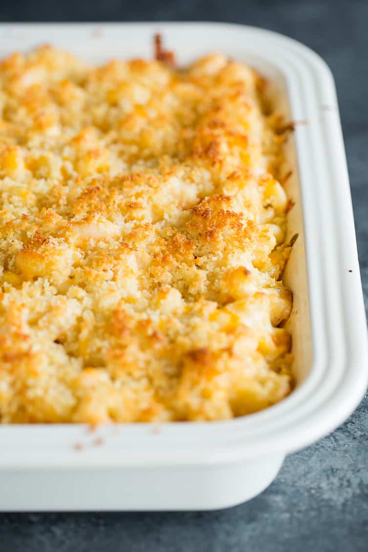 A bubbling casserole dish full of Cajun shrimp macaroni and cheese.