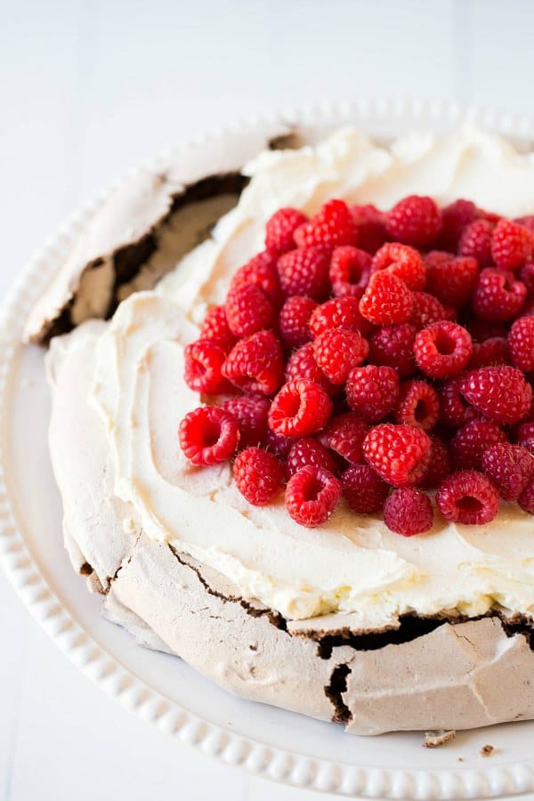 Chocolate Pavlova with Mascarpone Whipped Cream and Raspberries