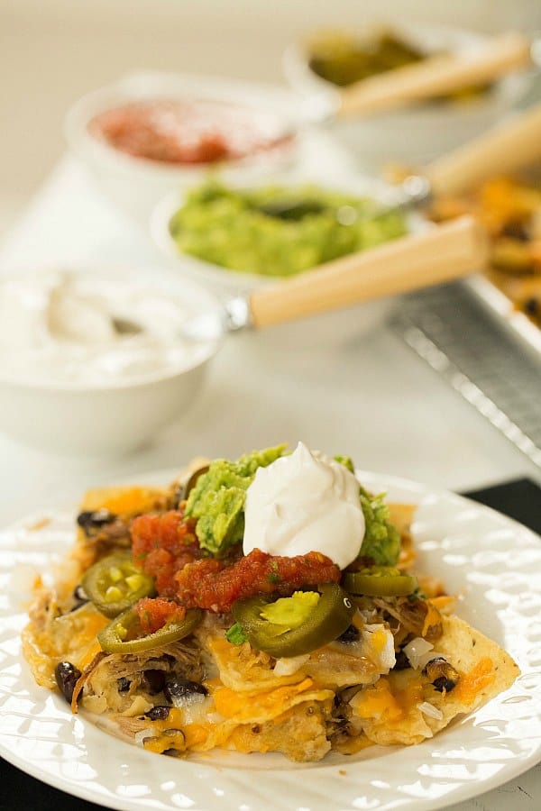 Ultimate Nachos with Beer-Braised Carnitas by @browneyedbaker :: www.browneyedbaker.com