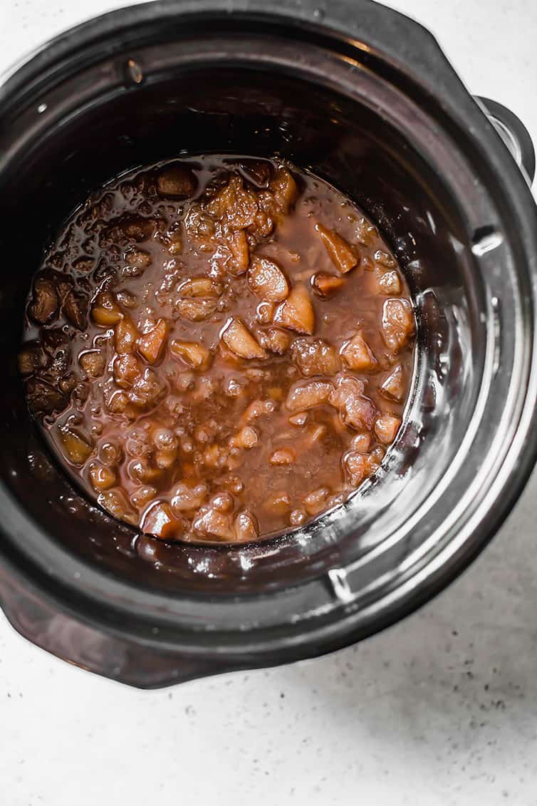 Apple butter finished cooking in the slow cooker.