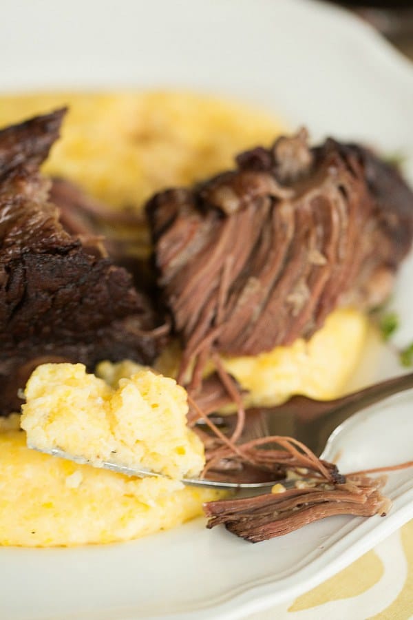 Braised Short Ribs with Cheesy Grits | browneyedbaker.com