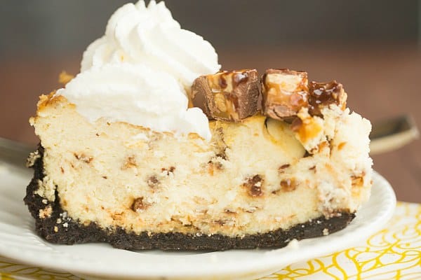 Snickers Cheesecake | browneyedbaker.com #recipe
