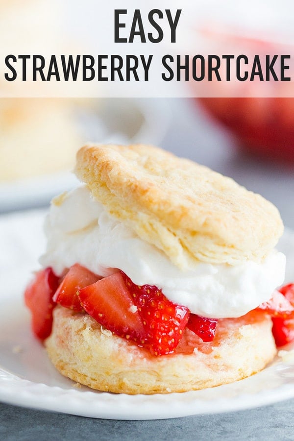 Easy Strawberry Shortcake :: Homemade buttermilk biscuits are topped with fresh, macerated strawberries, and homemade whipped cream. A summer staple! #browneyedbaker #strawberryshortcake #strawberries #summerdesserts #whippedcream #biscuits #homemadebiscuits