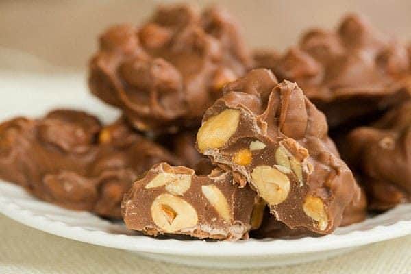 Crock-Pot Chocolate-Covered Peanut Clusters - SO easy and addictive! | browneyedbaker.com
