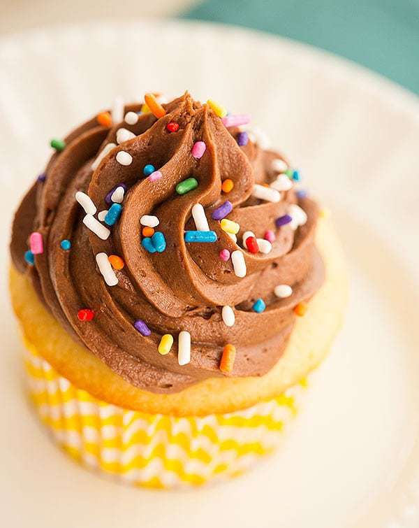 Vanilla Cupcakes with Chocolate Buttercream Frosting - The perfect cupcake for birthdays! | browneyedbaker.com