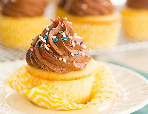 Vanilla Cupcakes with Chocolate Buttercream Frosting - The perfect cupcake for birthdays! | browneyedbaker.com