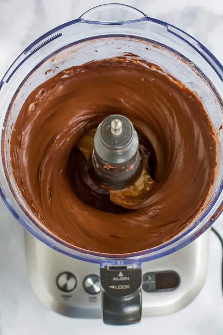 Chocolate frosting made in the food processor to top chocolate cupcakes.