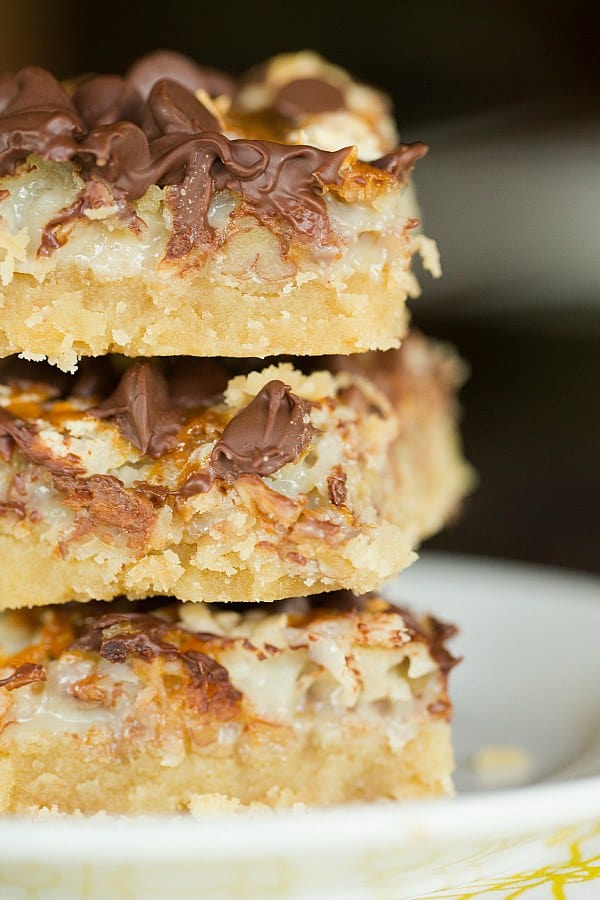 Ultimate Magic Bars - A brown sugar shortbread crust, pecans, coconut, chocolate chips and caramel set in sweetened condensed milk. Easy and delicious! | browneyedbaker.com